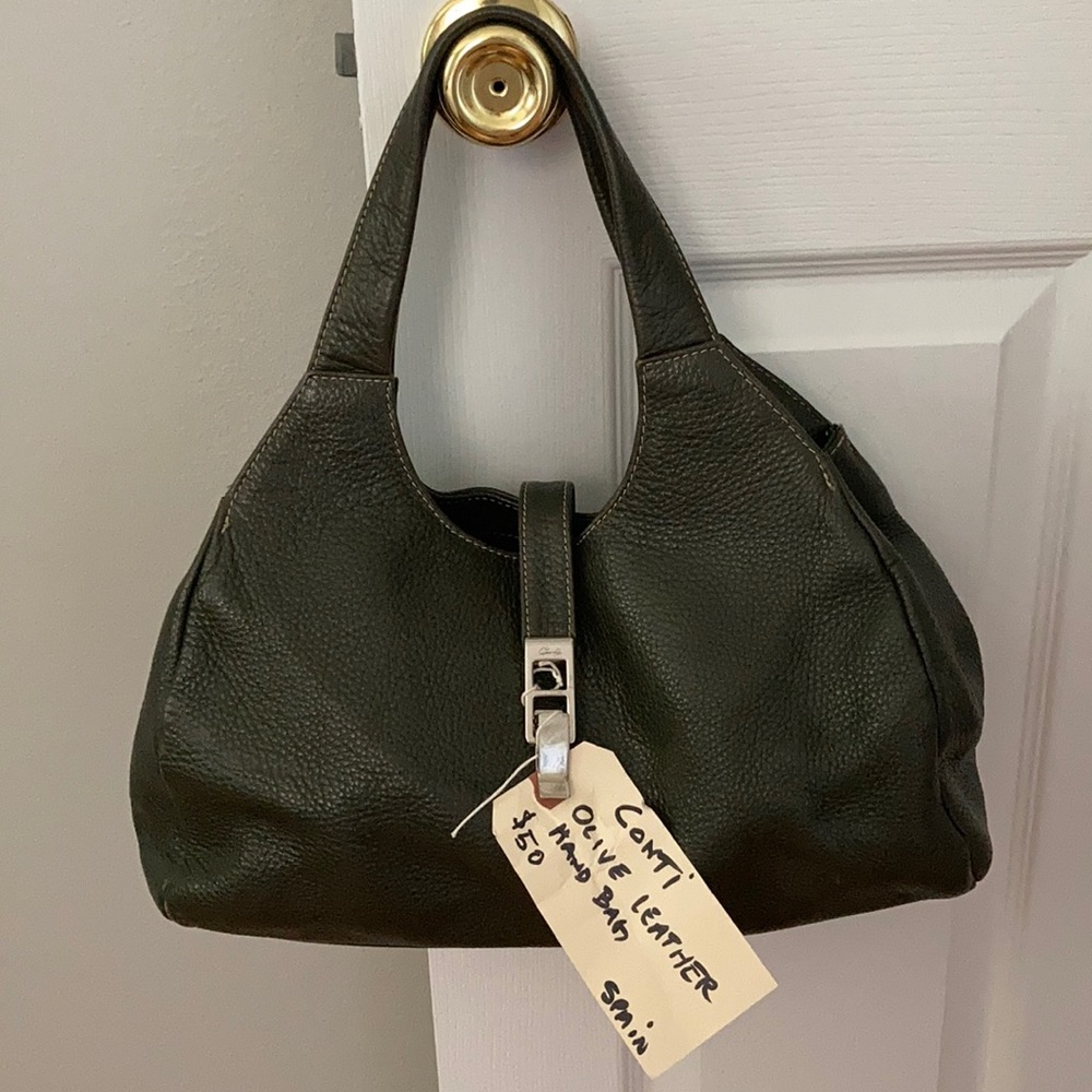 Olive green like new leather handbag from Spain